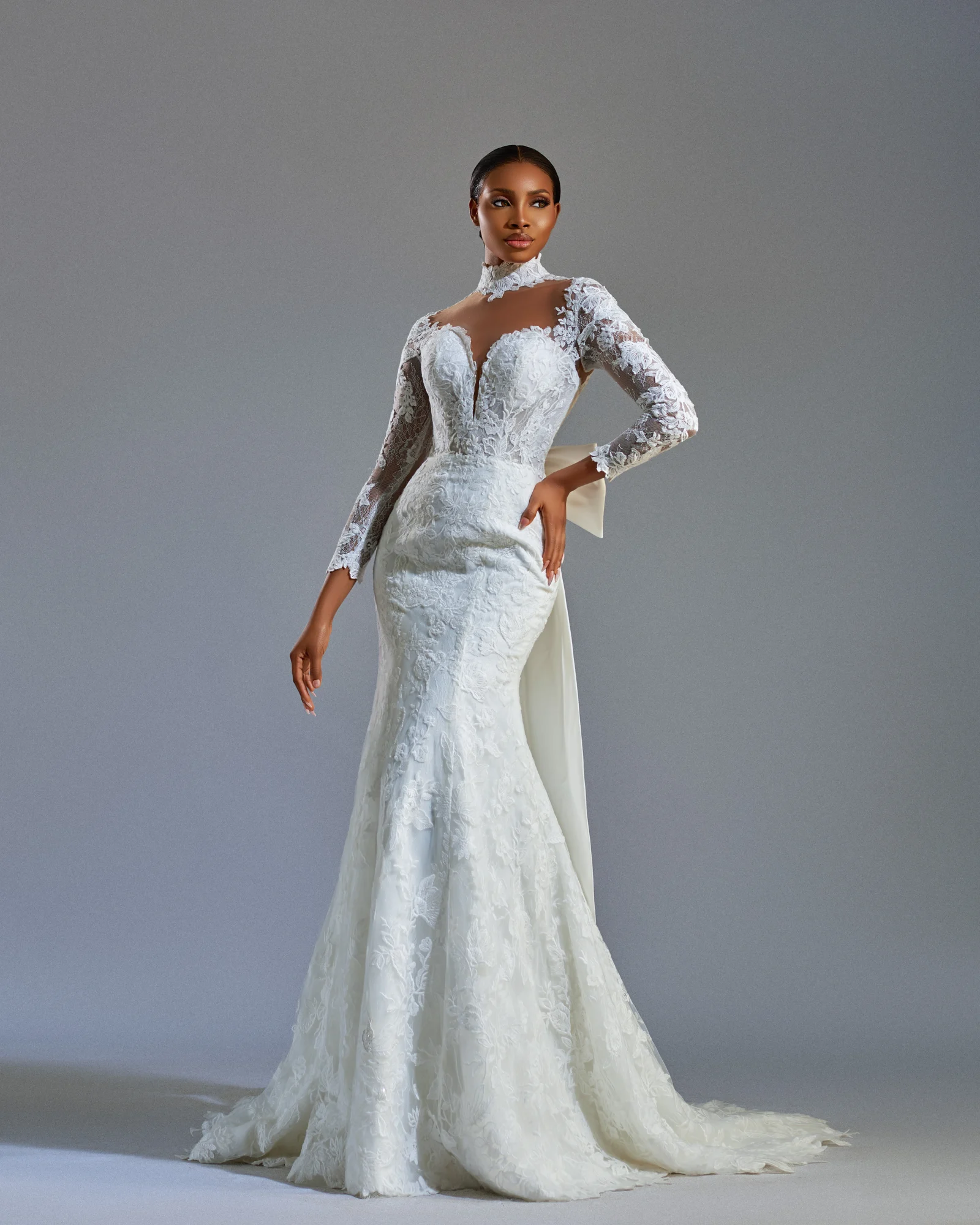 Esther gown with hand placed lace and a sculpted silhouette